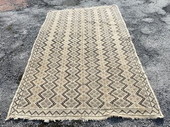 A Vintage Woven Geometric Carpet, Possibly African