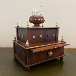 A Victorian Sewing Box With Pin Cushion