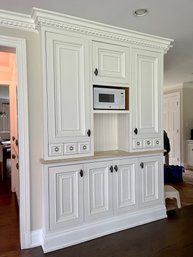A Custom Wood Pantry With Uppers And Lowers
