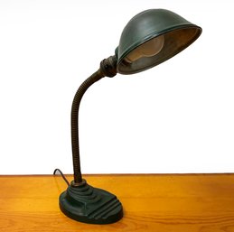 An Art Deco Iron Desk Lamp