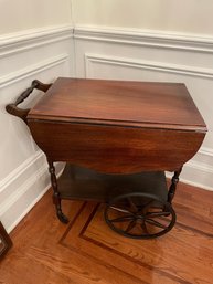 Vintage Mahogany Drop Leaf Serving Cart With Glass Tray Top.