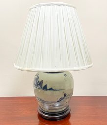 A Salt Glazed Ceramic Lamp On Wood Base