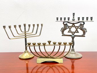 A Trio Of Vintage Brass Menorahs, Including An Israeli Model Designed By Oron