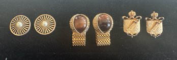 Trio Of Gold Tone Cufflinks Including Tigers Eye, Pearl And Crest With Sword