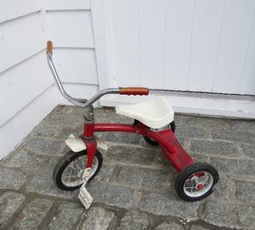 A Vintage  Red Metal Tricycle
