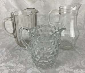 Three Glass Water Pitchers