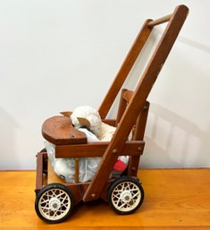 A Vintage Pine Doll Carriage And Clothing