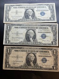 3 $1 Silver Certificates 1935 Series E, 1957 Series B, 1935 Series A