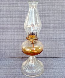 A 19th Century Amber And Clear Glass Hurricane Lamp