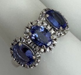 SIGNED JBC STERLING SILVER TANZANITE AND WHITE STONE RING