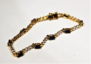 Gold Over Sterling Silver Bracelet Having Sapphire Stones