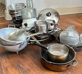 A Vintage Kitchen Assortment - Cast Iron, Pots, Pans, Racks, And Much More!
