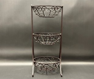 A Three-Tier Metal Basket Stand