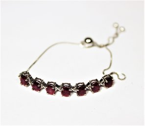 Sterling Silver Slide Closure Bracelet Having Genuine Ruby Stones