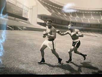 Photograph Of Ken Norton Chasing Ali At Yankee Stadium