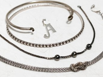 A Collection Of Sterling Silver Bracelets And More