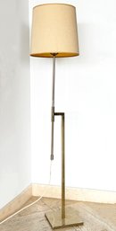 A MID CENTURY MODERN ADJUSTABLE BRASS FLOOR LAMP BY THE LAUREL LAMP COMPANY