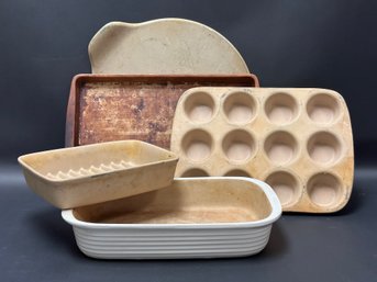 A Great Assortment Of Pampered Chef Stoneware Baking Pans