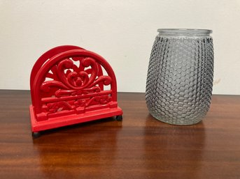 A Cast Iron Napkin Holder And Glass Vase