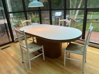 Contemporary Oval Dining Table With Laminated Top.