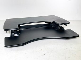 A Vari Desk Adjustable Height Desk