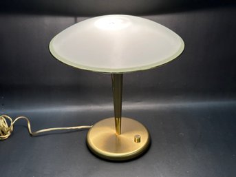 A Desk Lamp In Brass With A Frosted Dome Shade, Dimmable