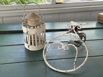 A Metal Lantern And Decor