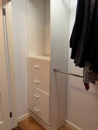 A Four Drawer Closet System With Chrome Hanging Bars - Closet 2A