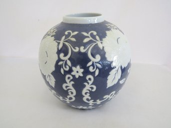 A Round Shaped Blue And White Vessels With Floral Design