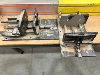A Pair Of Large Screw Drive Bench Vises