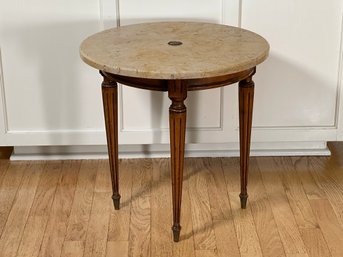 A Vintage Side Table With A Natural Stone Top