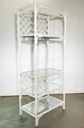 A Vintage Rattan Etagere With Glass Shelves