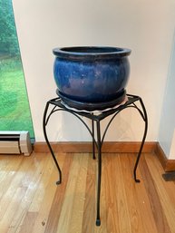 Metal Plant Stand With Glazed Pottery Planter.