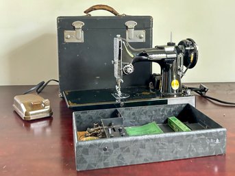 A Miniature Singer Sewing Machine In Original Box, With Instructions