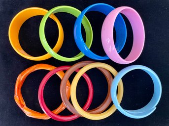 A Rainbow Of Nine Mid Century Bangle Bracelets