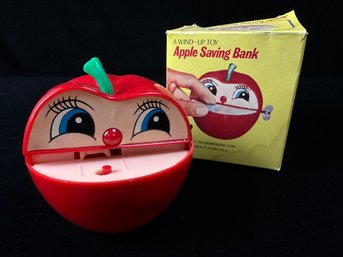 A Wind Up Toy Apple Saving Bank