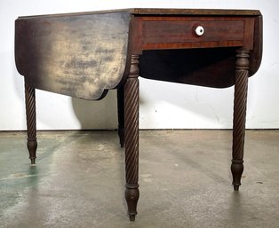 An Antique Dark Mahogany Drop Leaf Pembroke Table With Barley Twist Legs