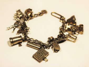 Fantastic Vintage Sterling Silver Charm Bracelet Including Cat, Lawnmower, Holy Bible