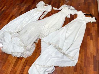 A Group Of Vintage Bridal Gowns