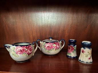 Vintage Porcelain Sugar And Creamer And Salt And Pepper Set