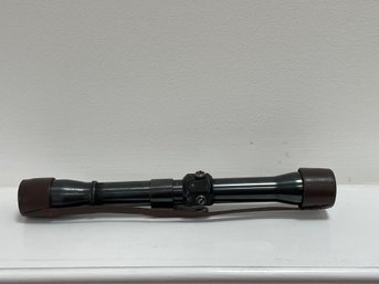 Weaver K4 Rifle Scope With Leather Smith Cover
