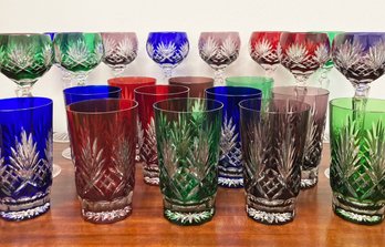 An Assortment Of Fine Cobalt, Ruby, Emerald, And Amethyst Bohemian Crystal Stemware