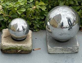 Pair Of Silver Gazing Balls With Square Cement Stands