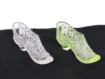 A Pair Of EAPG Daisy & Button Glass Shoes Including One Uranium Glass Advertising Shoe!
