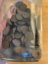 Wheat Pennies Collection In A Jar.