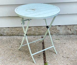 A Metal Folding Cocktail Table