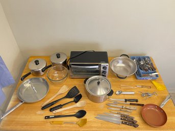 Lot Of Utensils, Pots And Pans, And Toaster Oven