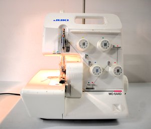 Working Juki MO-644D Sewing Machine