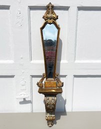 A Mirrored Wall Shelf Or Niche