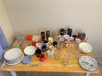 Large Lot Of Glassware, Tupperware, And Dishes